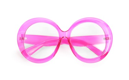 Photo of Stylish bright pink glasses isolated on white, top view