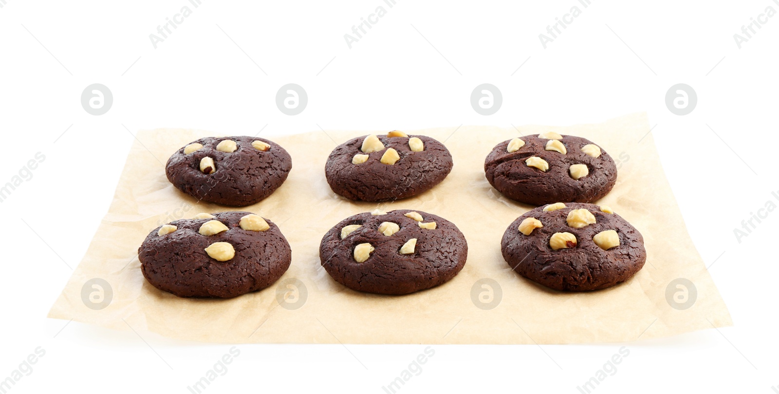 Photo of Tasty chocolate cookies with hazelnuts isolated on white