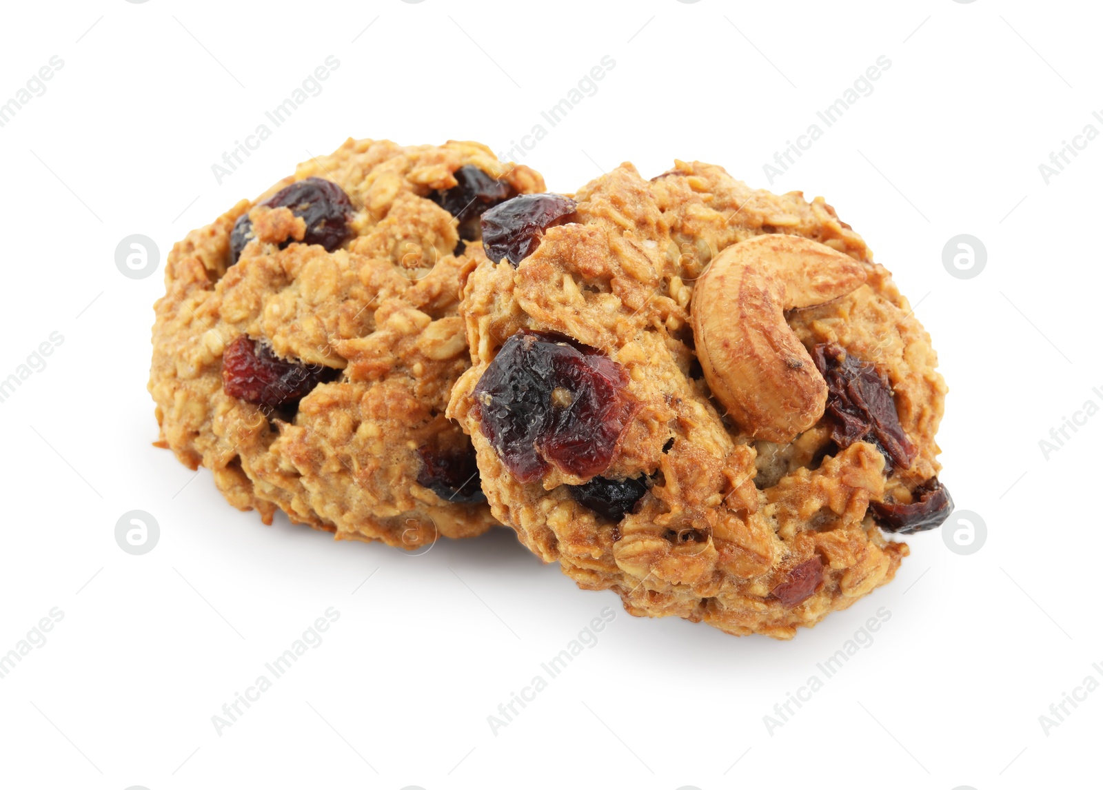 Photo of Delicious oatmeal cookies with dried cranberries and nuts isolated on white