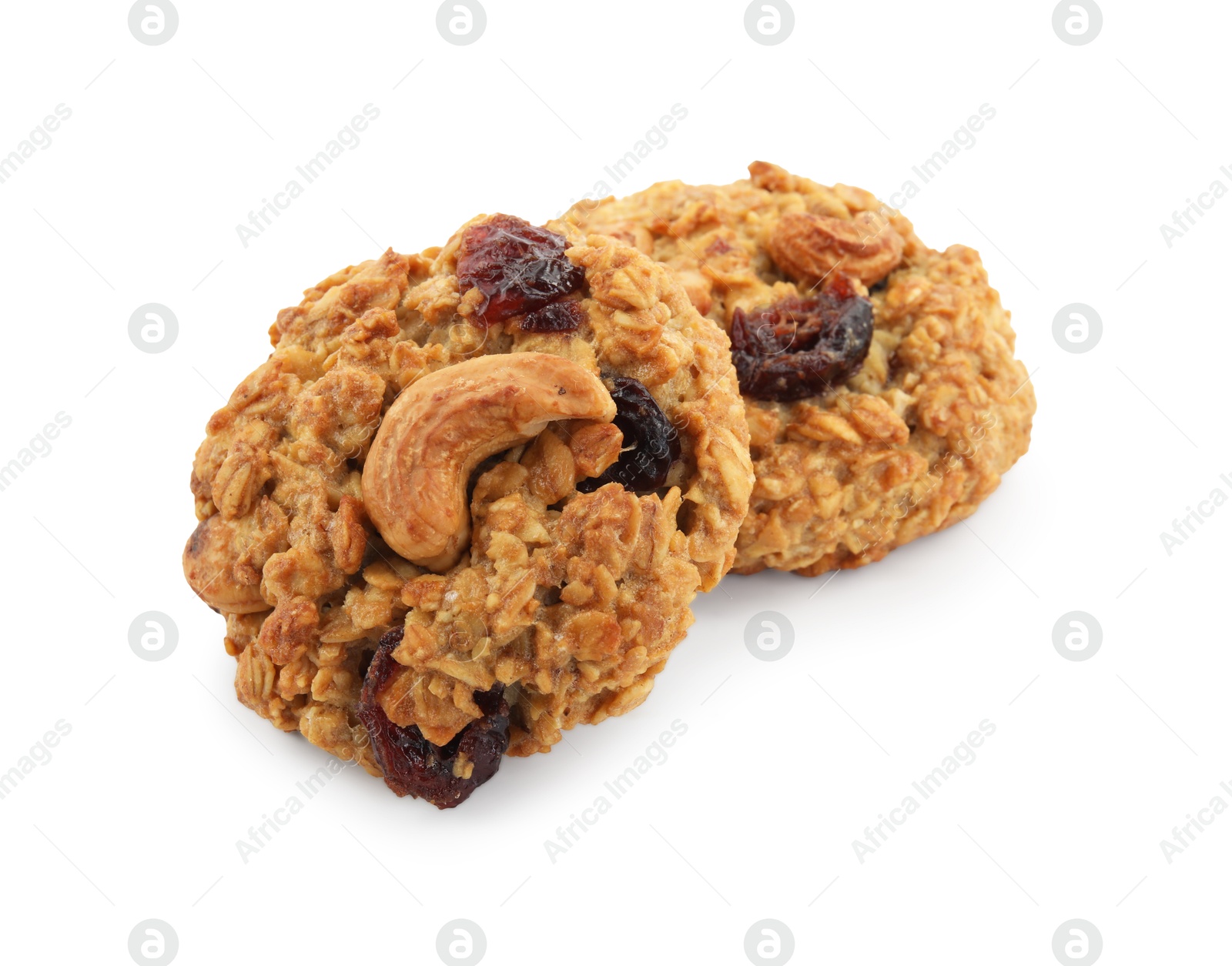 Photo of Delicious oatmeal cookies with dried cranberries and nuts isolated on white