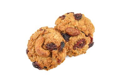 Photo of Delicious oatmeal cookies with dried cranberries and nuts isolated on white, top view