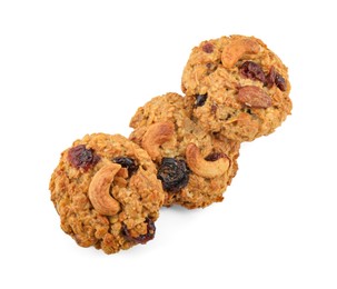 Photo of Delicious oatmeal cookies with dried cranberries and nuts isolated on white, top view