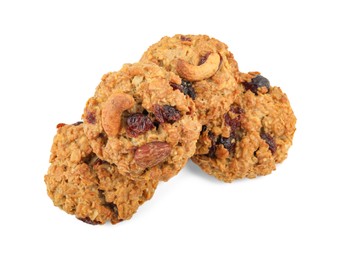 Photo of Delicious oatmeal cookies with dried cranberries and nuts isolated on white, top view