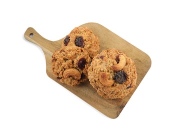 Photo of Delicious oatmeal cookies with dried cranberries and nuts isolated on white, top view