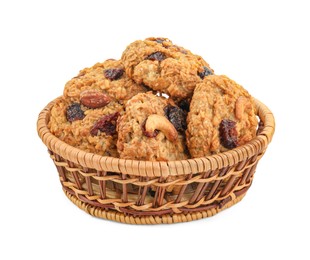 Photo of Delicious oatmeal cookies with dried cranberries and nuts in wicker basket isolated on white