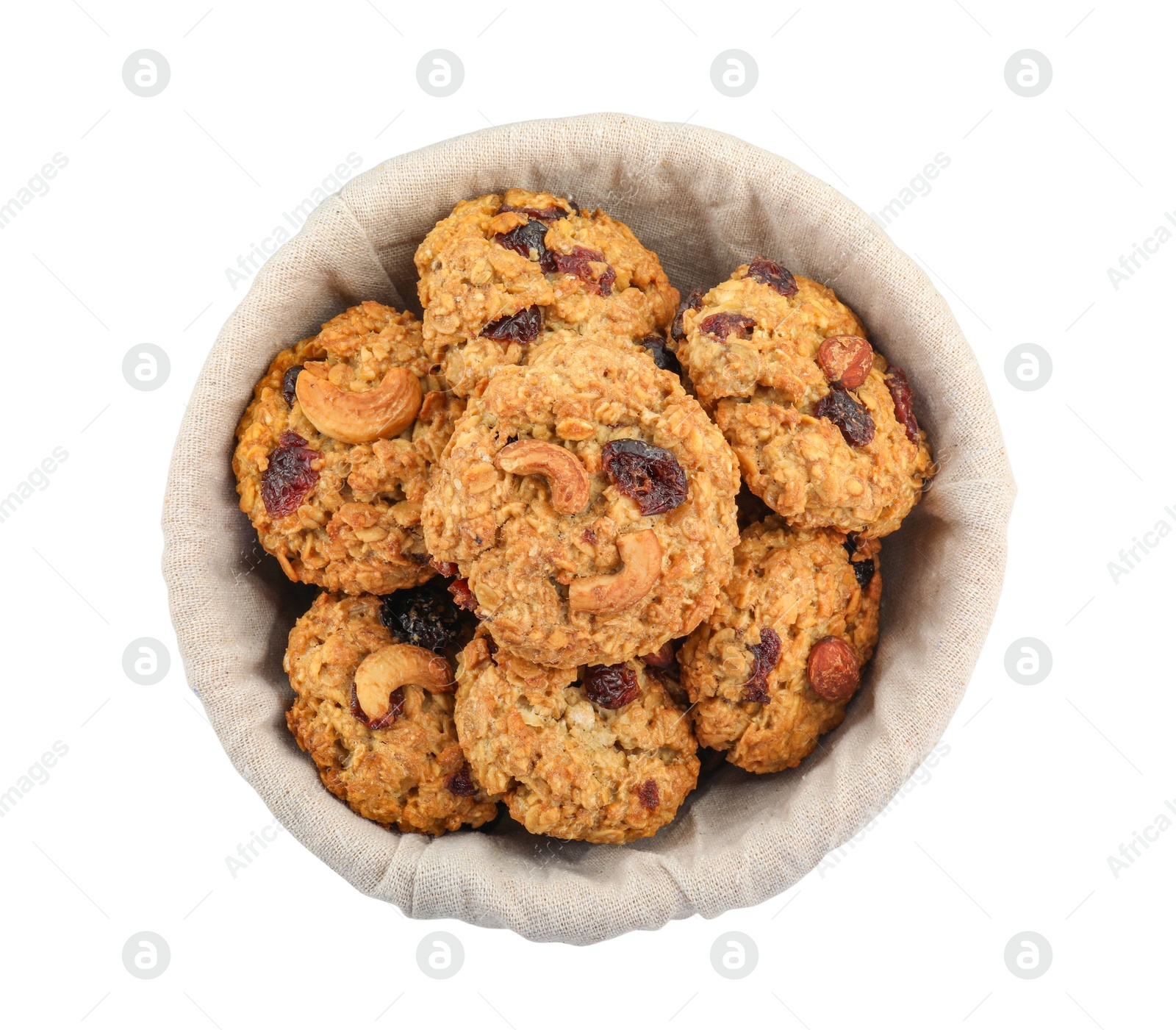 Photo of Delicious oatmeal cookies with dried cranberries and nuts in bowl isolated on white, top view