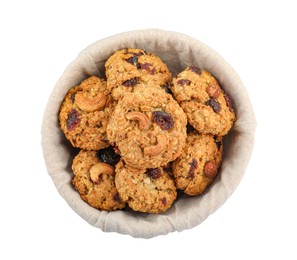 Photo of Delicious oatmeal cookies with dried cranberries and nuts in bowl isolated on white, top view