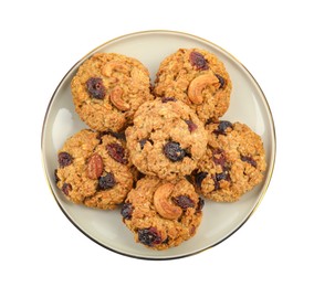 Photo of Delicious oatmeal cookies with dried cranberries and nuts isolated on white, top view