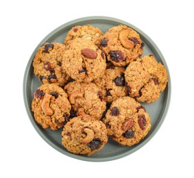 Photo of Delicious oatmeal cookies with dried cranberries and nuts isolated on white, top view