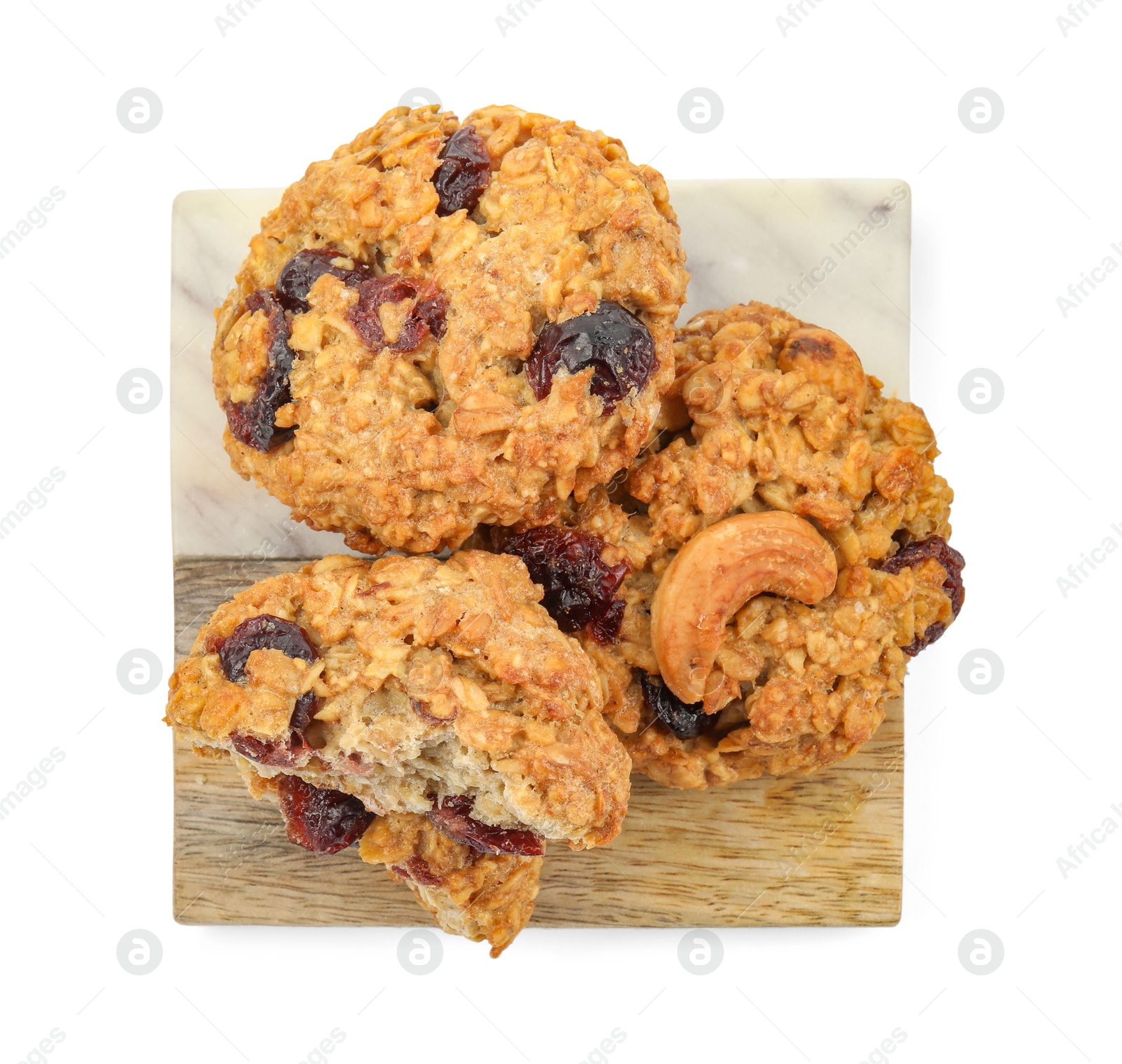 Photo of Delicious oatmeal cookies with dried cranberries and nuts isolated on white, top view