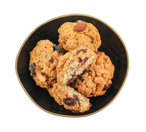 Photo of Delicious oatmeal cookies with dried cranberries and nuts in bowl isolated on white, top view