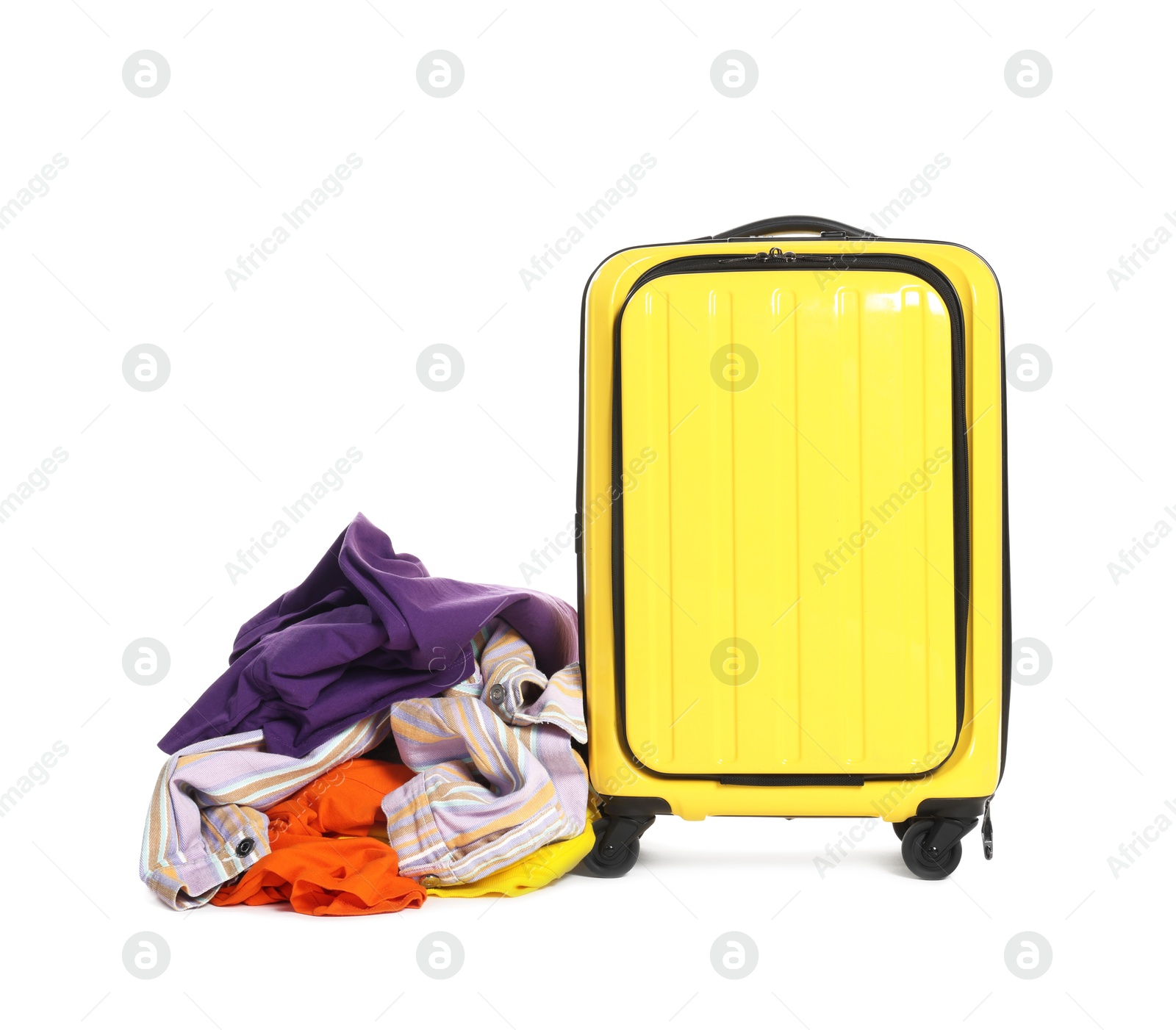 Photo of Suitcase and messy pile of clothes isolated on white