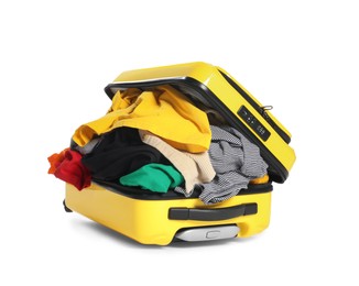 Photo of Packed suitcase full of clothes isolated on white