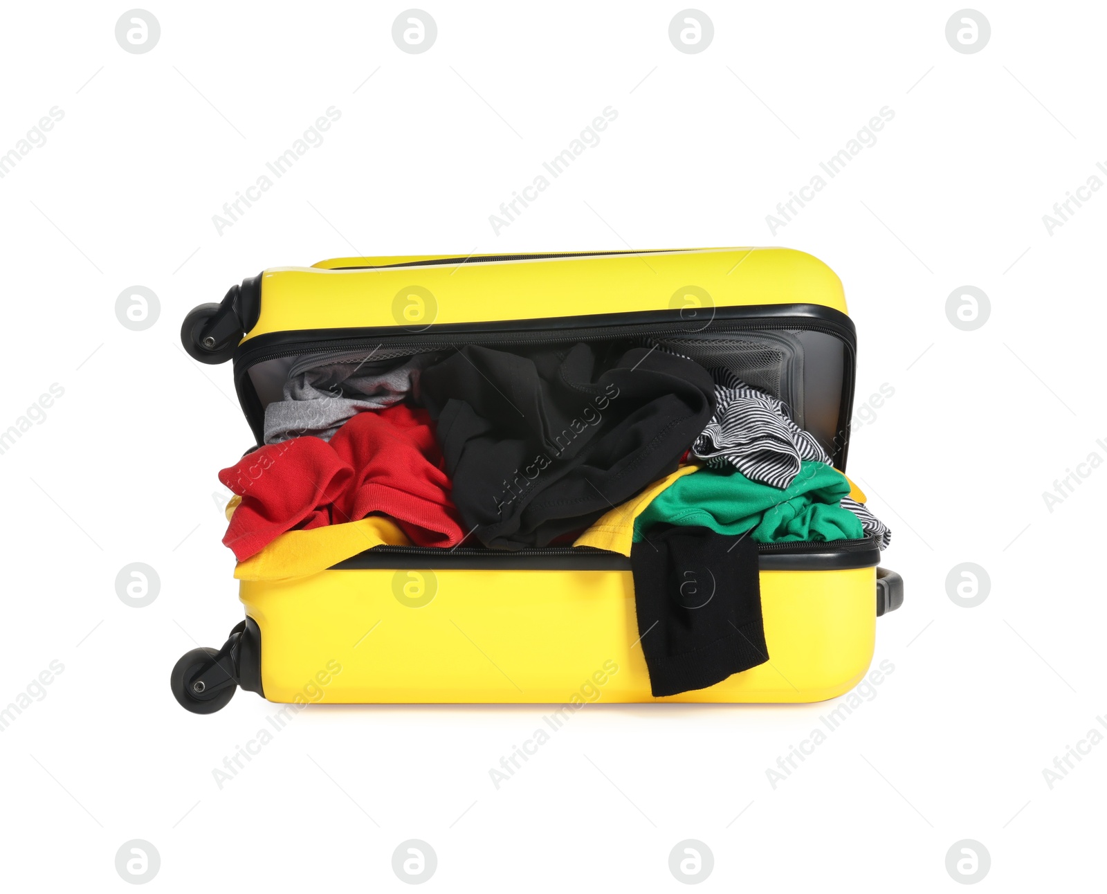 Packed suitcase full of clothes isolated on white Photo of Packed suitcase full of clothes isolated on white