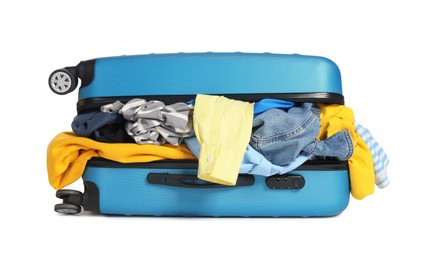 Photo of Packed suitcase full of clothes isolated on white