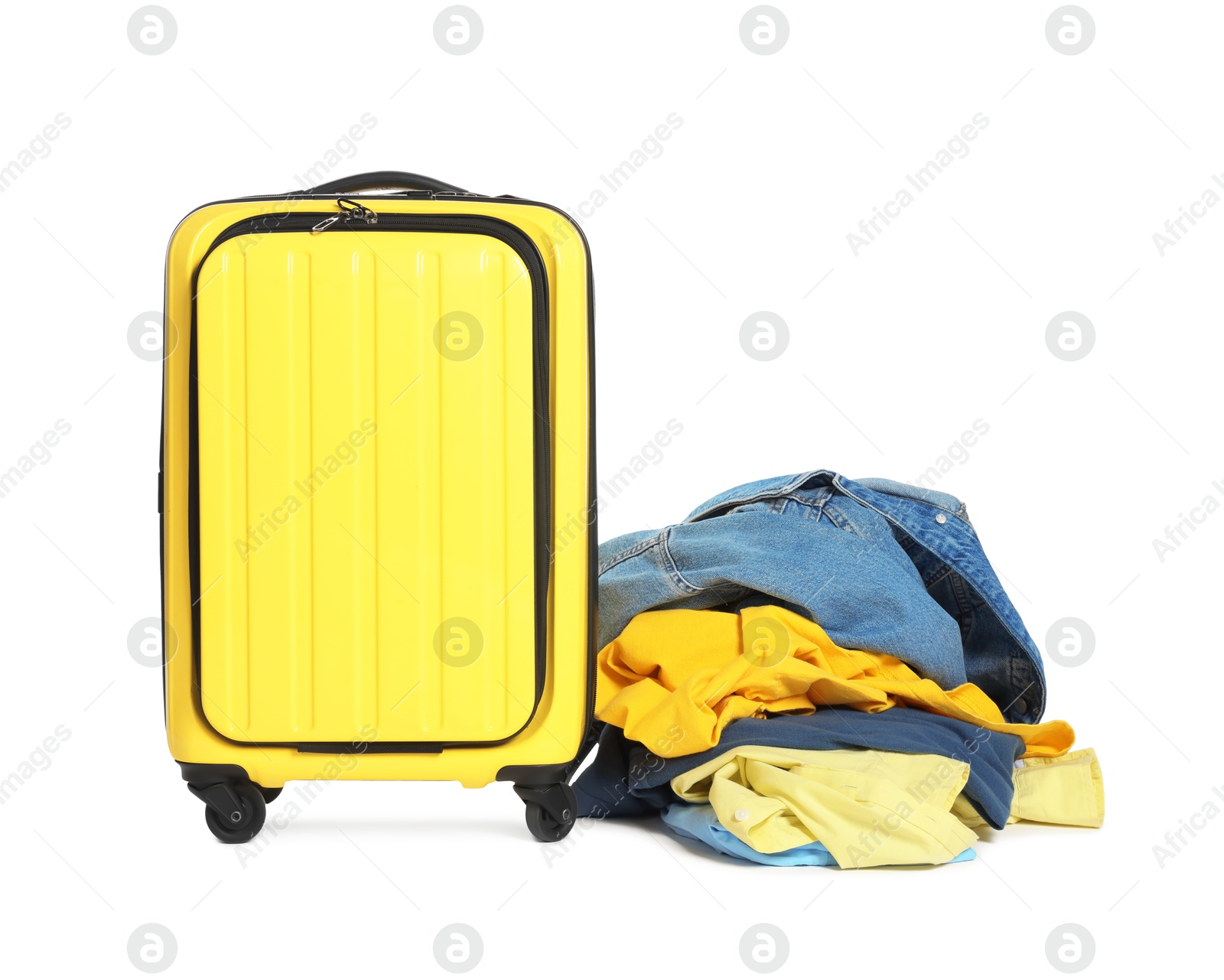 Photo of Suitcase and messy pile of clothes isolated on white