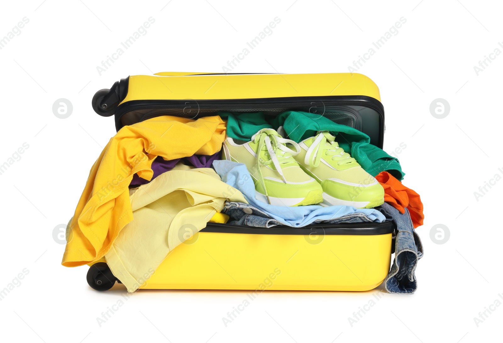 Photo of Packed suitcase full of clothes isolated on white