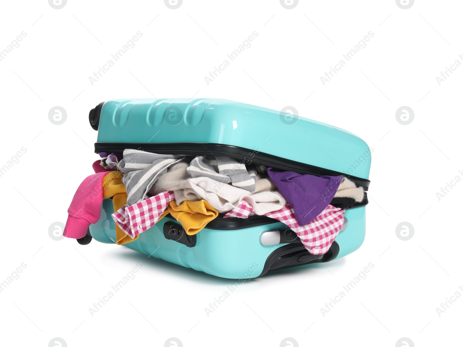 Photo of Packed suitcase full of clothes isolated on white