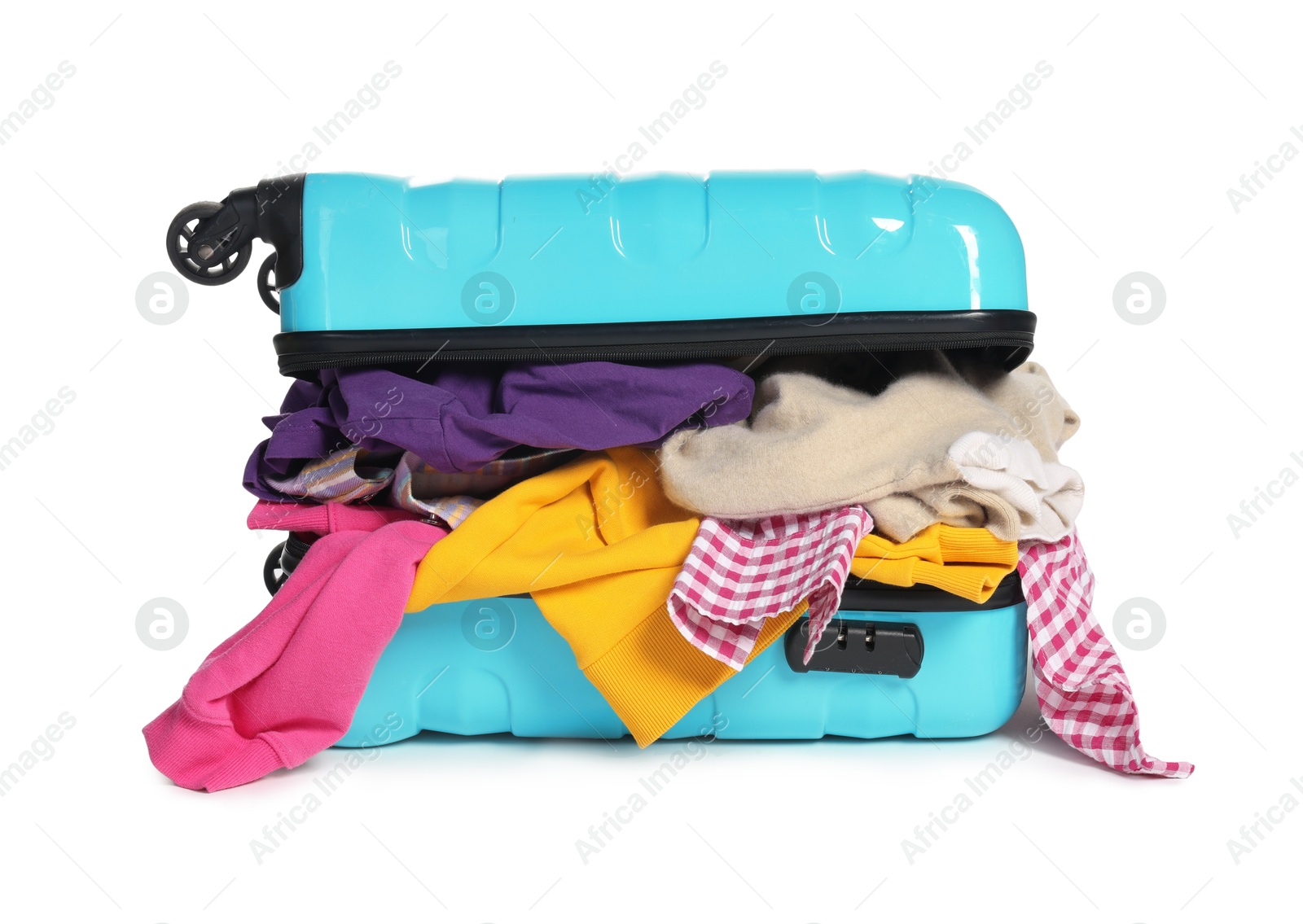 Photo of Packed suitcase full of clothes isolated on white