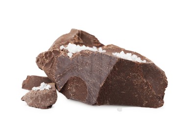 Photo of Pieces of chocolate with salt isolated on white