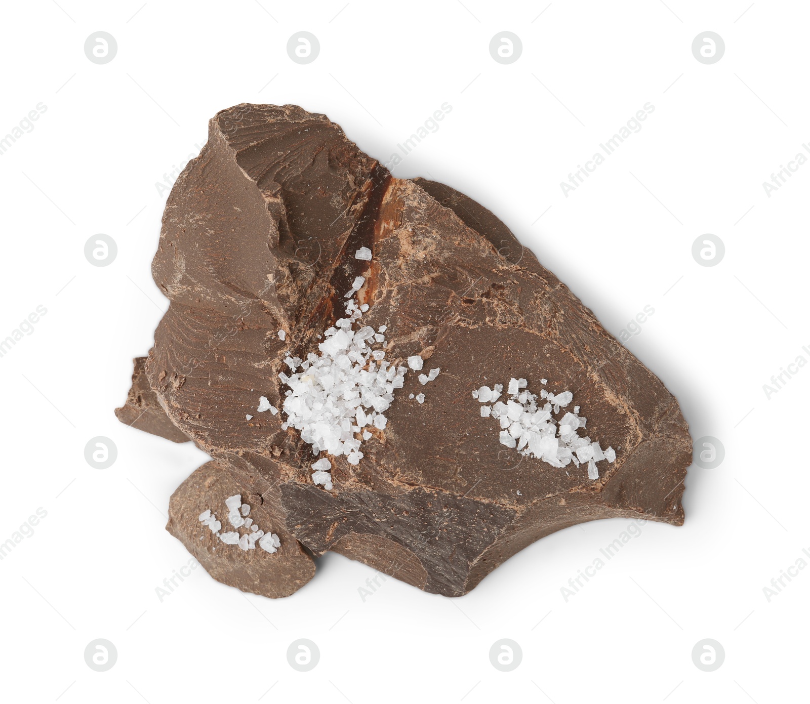 Photo of Pieces of chocolate with salt isolated on white, top view