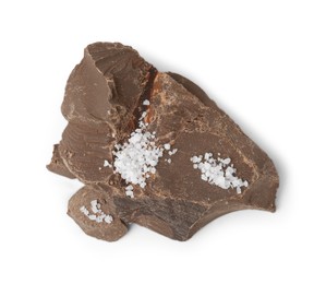 Photo of Pieces of chocolate with salt isolated on white, top view