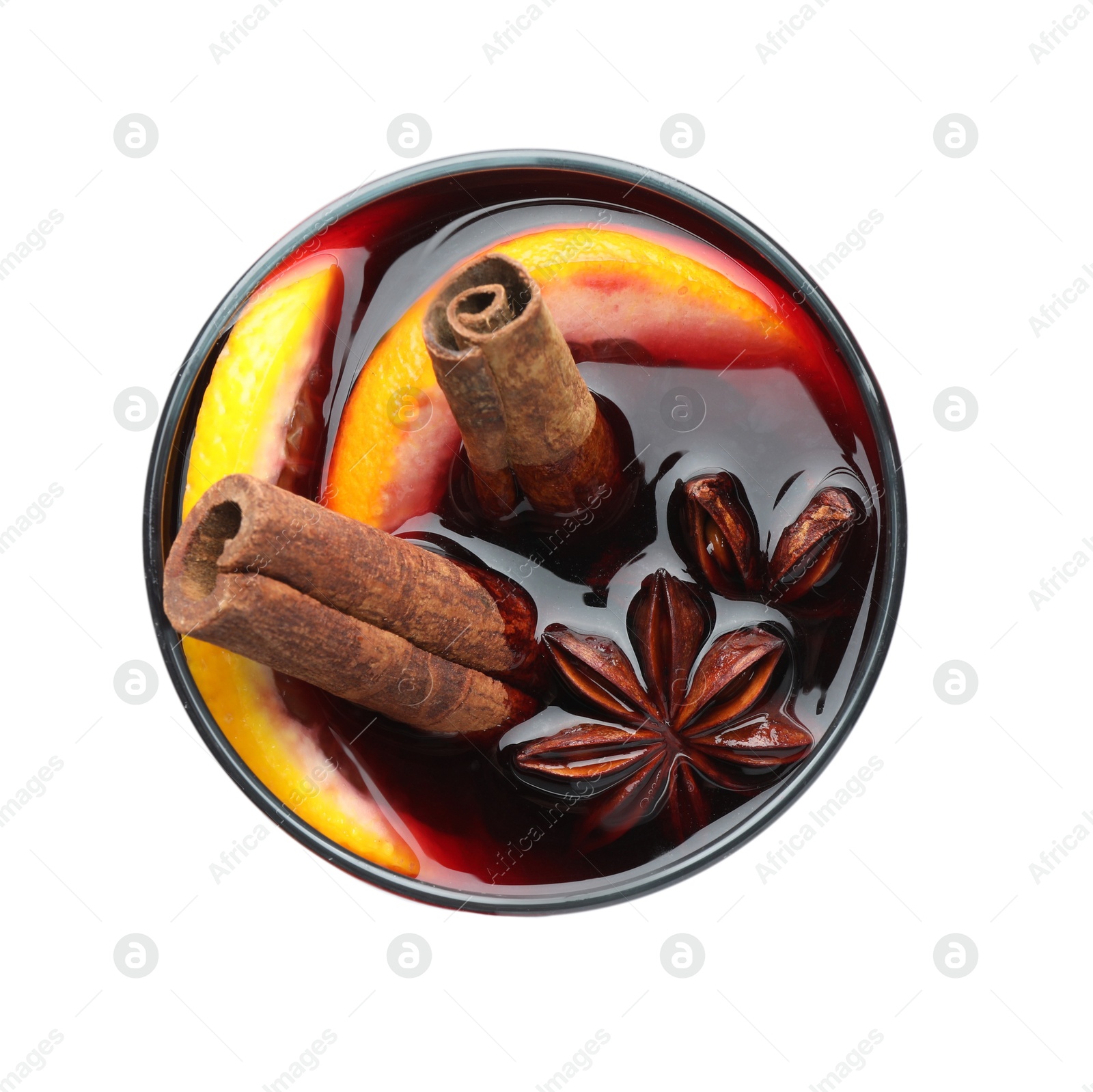 Photo of Tasty mulled wine with orange and spices isolated on white, top view