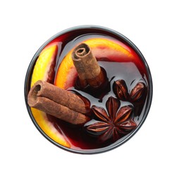 Photo of Tasty mulled wine with orange and spices isolated on white, top view