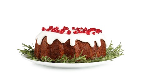 Photo of Traditional Christmas cake decorated with currants and rosemary isolated on white