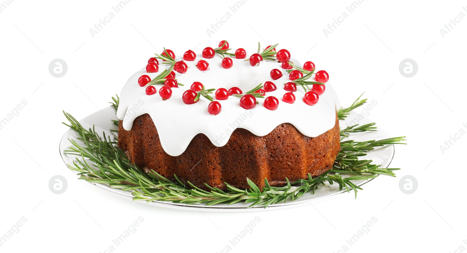 Photo of Traditional Christmas cake decorated with currants and rosemary isolated on white