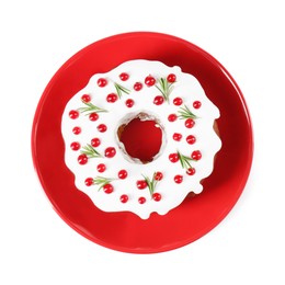 Photo of Traditional Christmas cake decorated with currants and rosemary isolated on white, top view