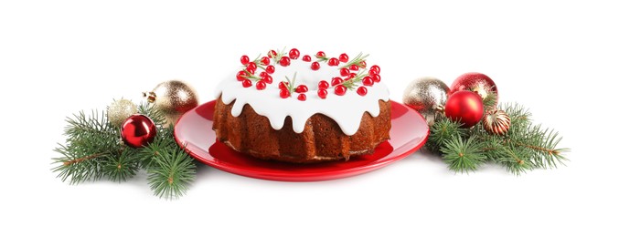 Beautifully decorated Christmas cake, fir branches and baubles on white background