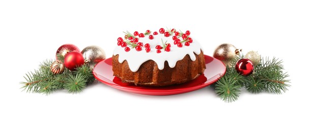 Photo of Beautifully decorated Christmas cake, fir branches and baubles on white background