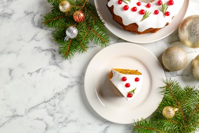 Photo of Traditional classic Christmas cake and decor on white marble table, flat lay. Space for text