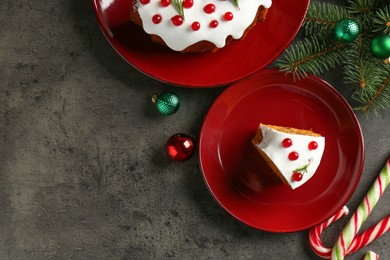 Photo of Traditional classic Christmas cake and decor on gray textured table, flat lay. Space for text