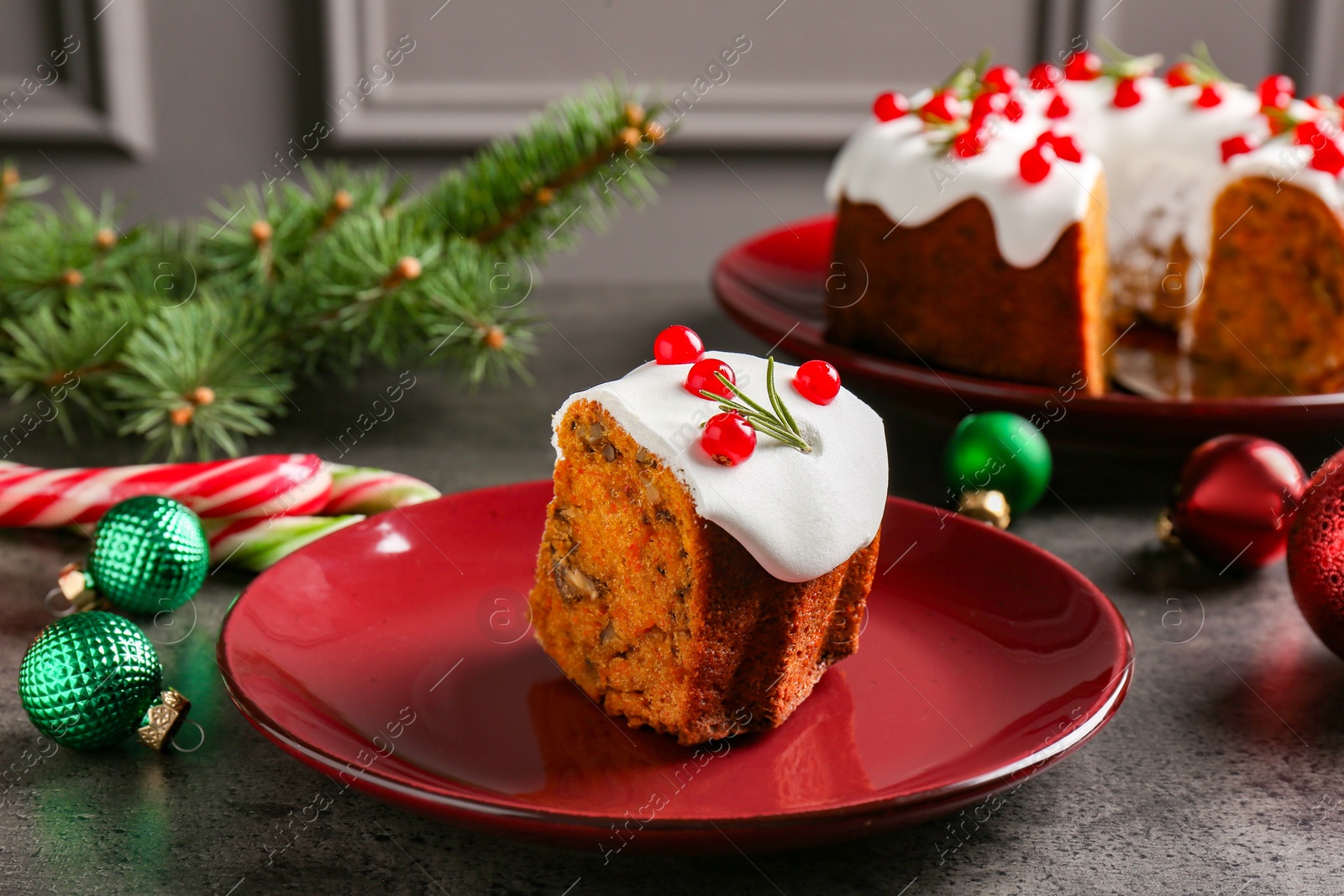 Photo of Traditional classic Christmas cake and decor on gray textured table