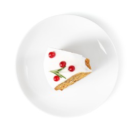 Photo of Piece of traditional Christmas cake decorated with red currants and rosemary isolated on white, top view