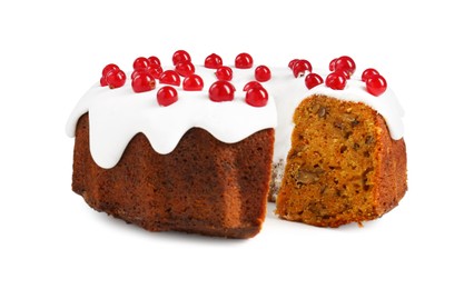 Photo of Traditional Christmas cake decorated with red currants isolated on white