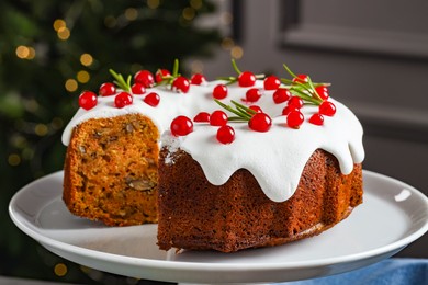 Photo of Traditional classic Christmas cake on table, closeup