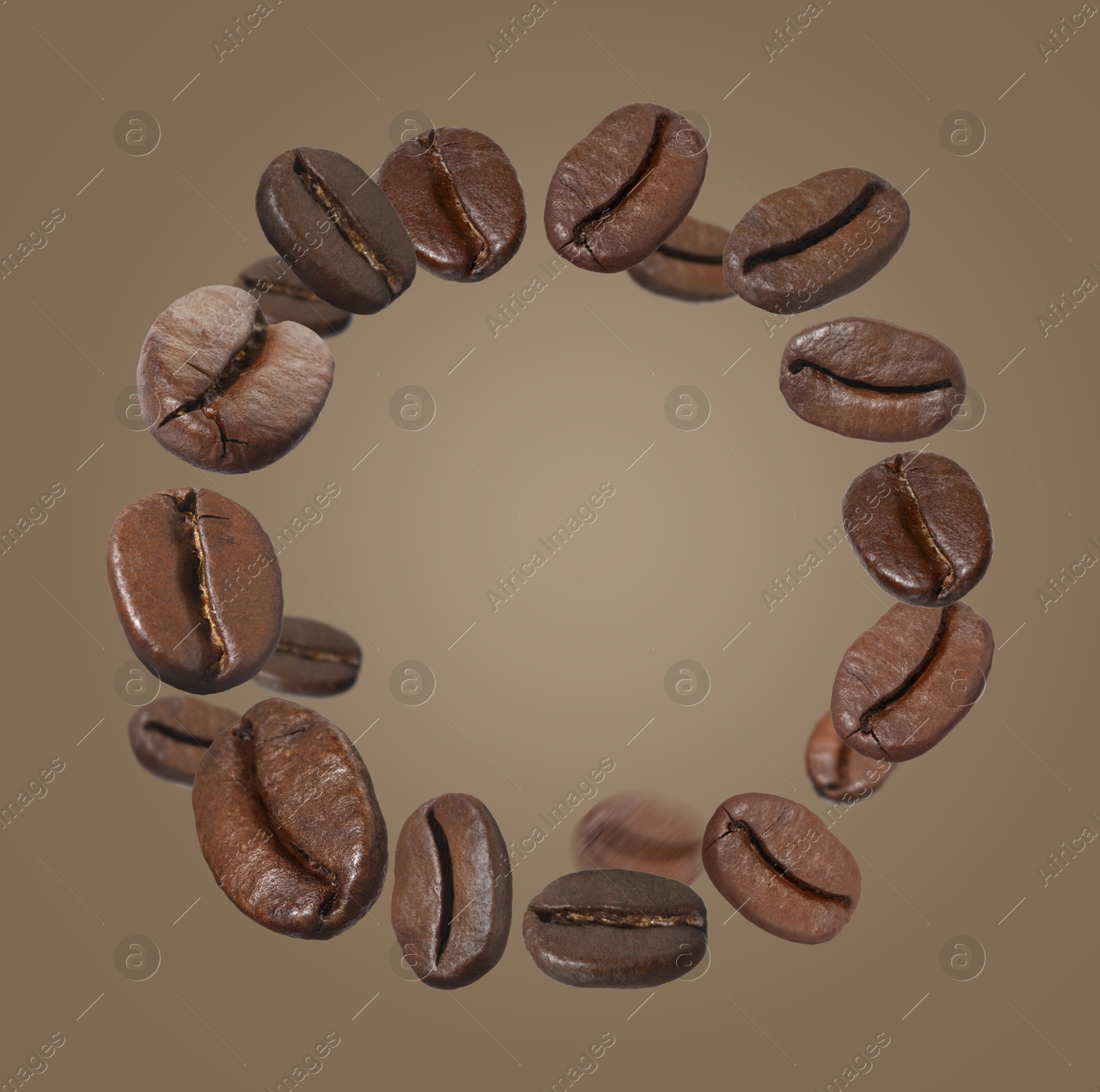 Image of Aromatic roasted coffee beans whirling in air on dark grey beige background