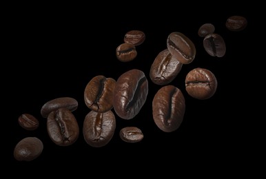 Image of Aromatic roasted coffee beans in air on black background