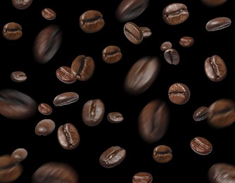 Image of Aromatic roasted coffee beans in air on black background