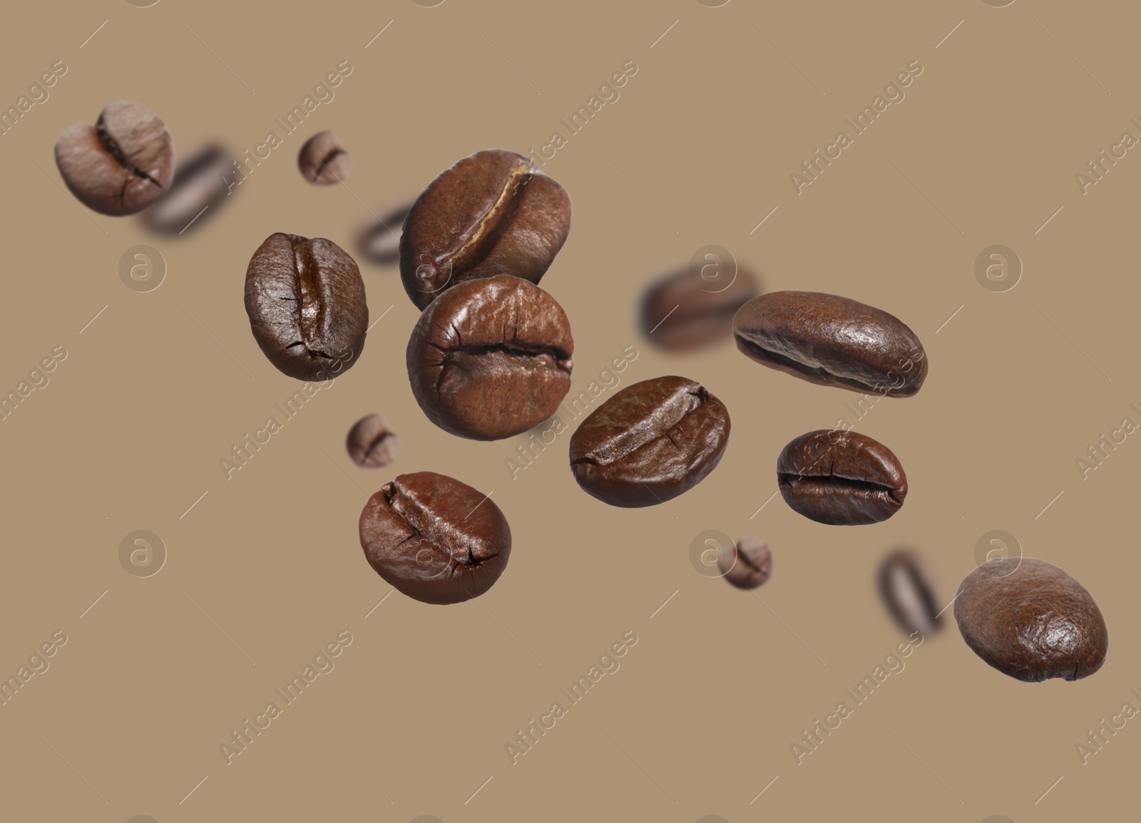 Image of Aromatic roasted coffee beans in air on grey beige background