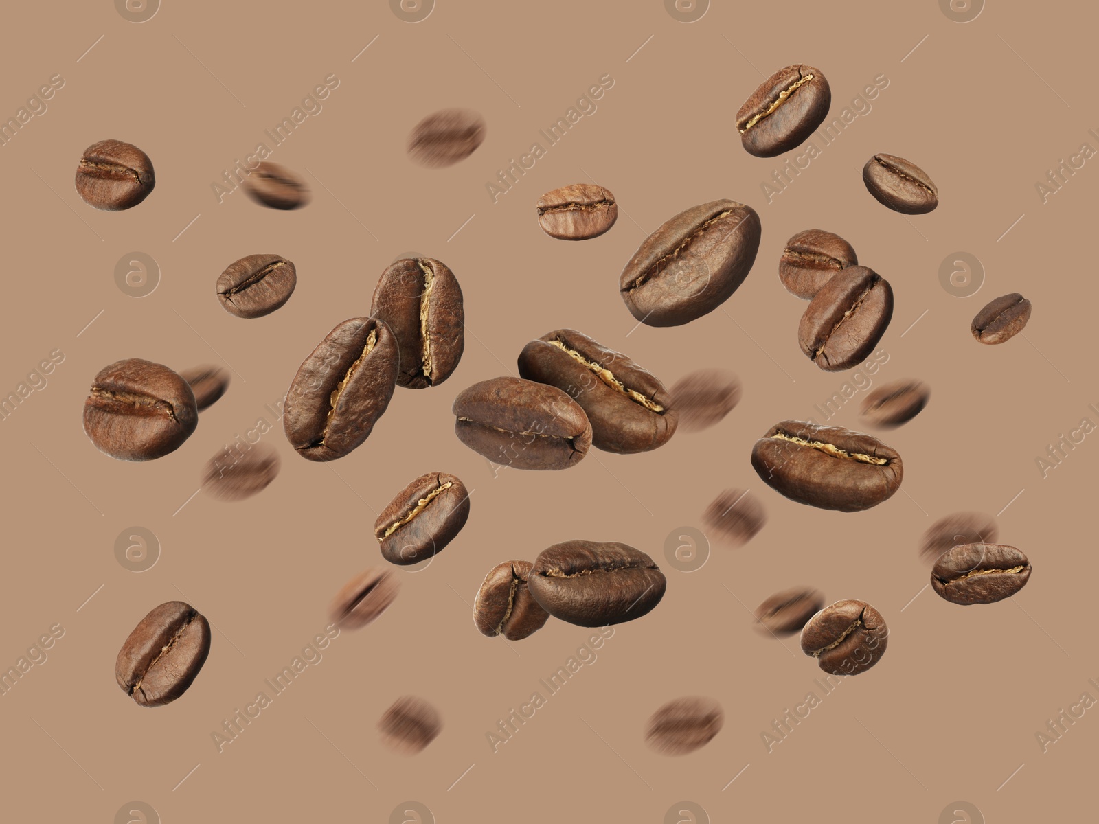 Image of Aromatic roasted coffee beans in air on dark beige background