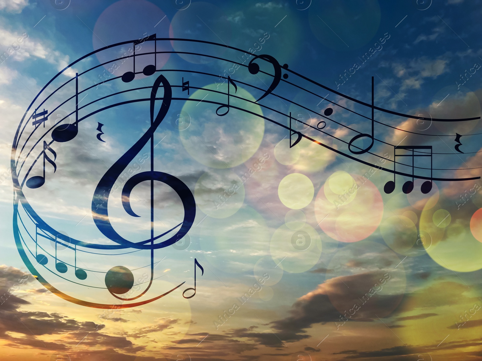 Image of Musical symbols in beautiful sunset sky with clouds