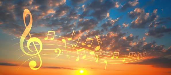 Image of Musical symbols in beautiful sunset sky with clouds. Banner design