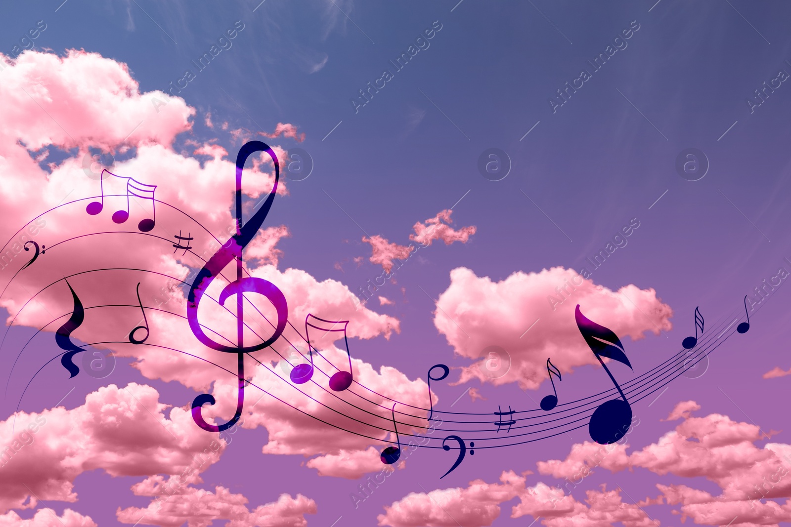 Image of Musical symbols in beautiful sky with clouds, color toned