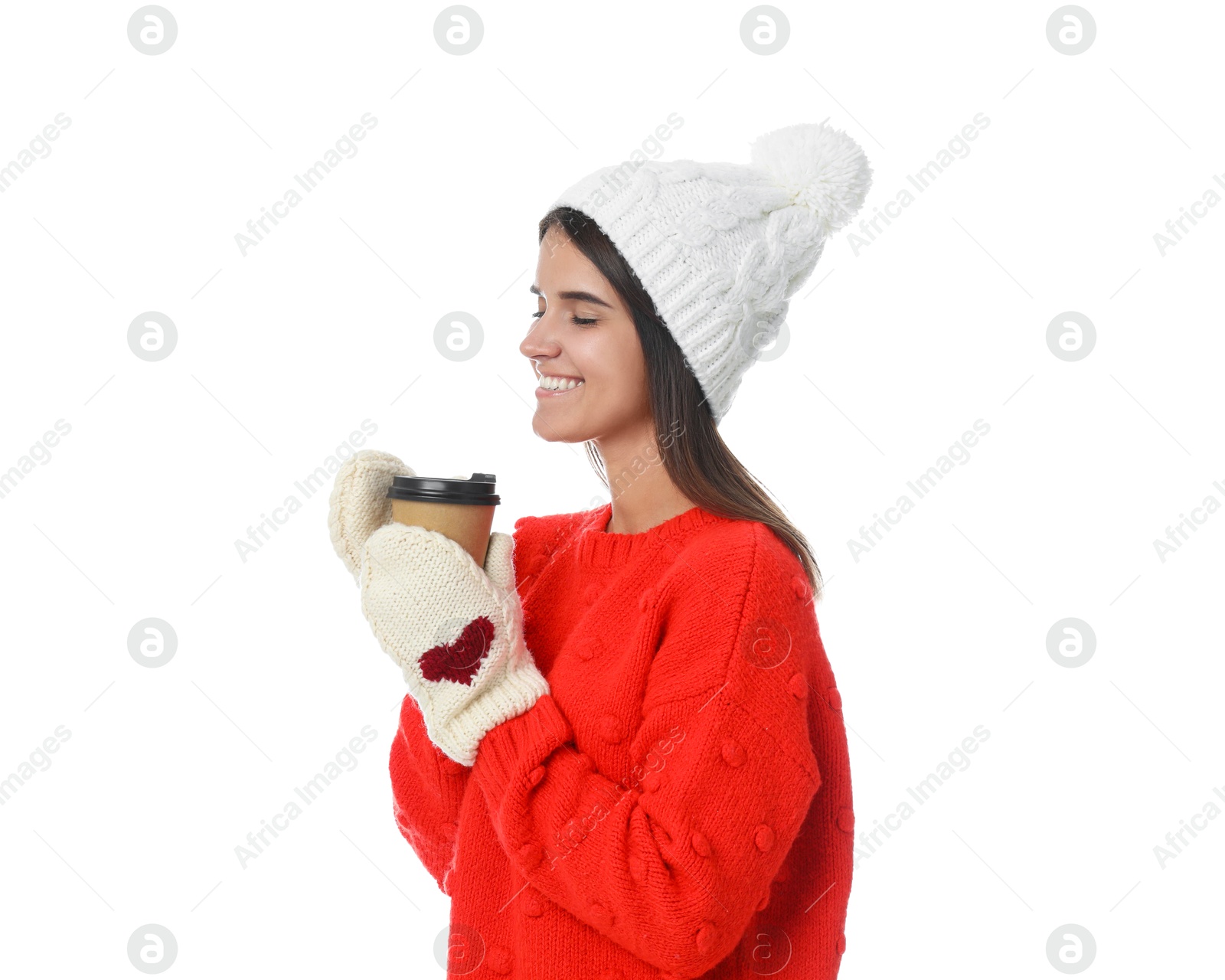 Photo of Happy beautiful woman with paper cup of mulled wine on white background