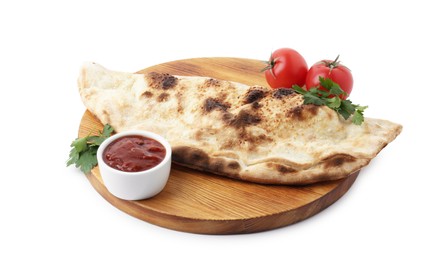 Delicious calzone with ketchup, fresh tomatoes and parsley isolated on white