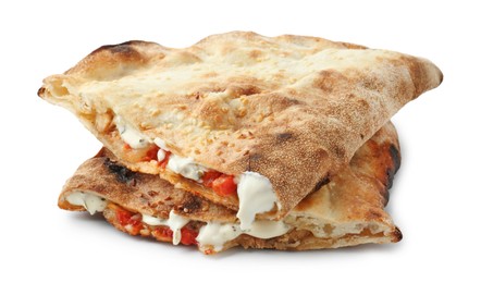 Halves of tasty calzone with meat, cheese, sauce and tomato isolated on white